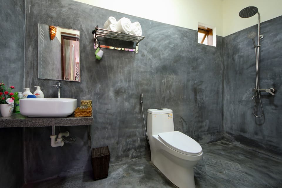 Shower, rainfall showerhead, designer toiletries, hair dryer