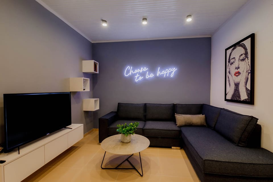 Comfort Villa, 2 Bedrooms | Living area | 32-inch flat-screen TV with satellite channels