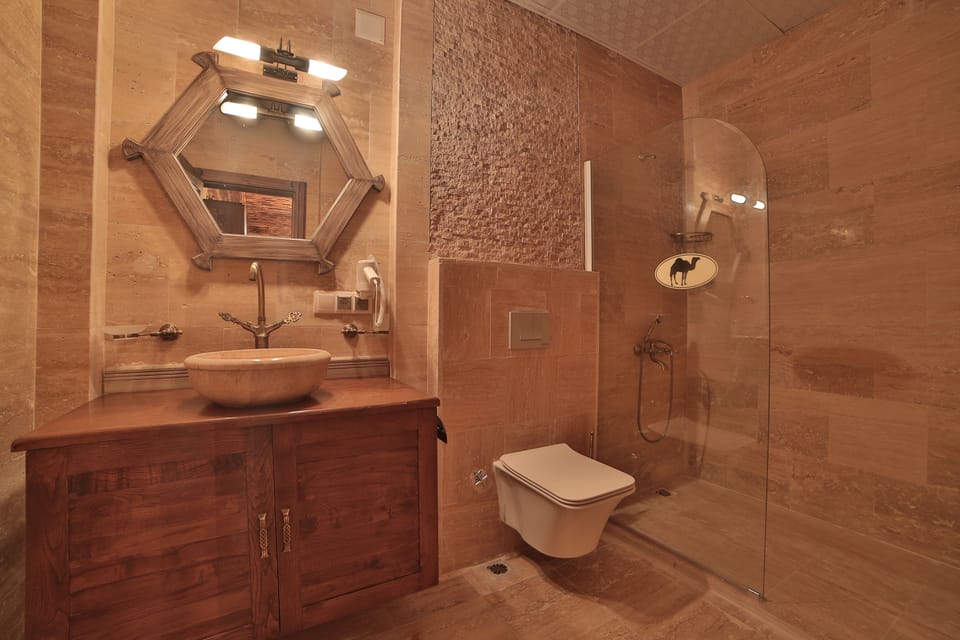 Standard Quadruple Room, Garden View | Bathroom | Designer toiletries, hair dryer, slippers, bidet