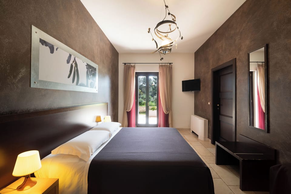 Triple Room, Multiple Beds, Private Bathroom, Garden View | Minibar, desk, blackout drapes, free WiFi