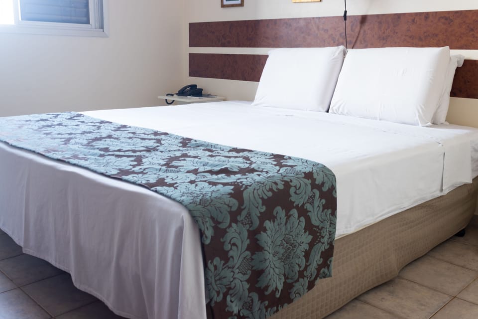 Deluxe Room | Iron/ironing board (on request), WiFi (free), bed sheets