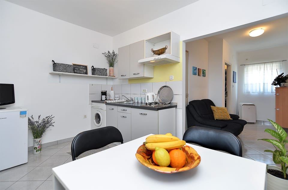 Standard Apartment, 2 Bedrooms (0130) | Living area | TV