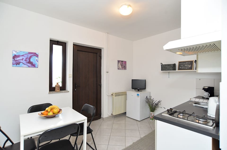 Standard Apartment, 2 Bedrooms (0130) | Living area | TV