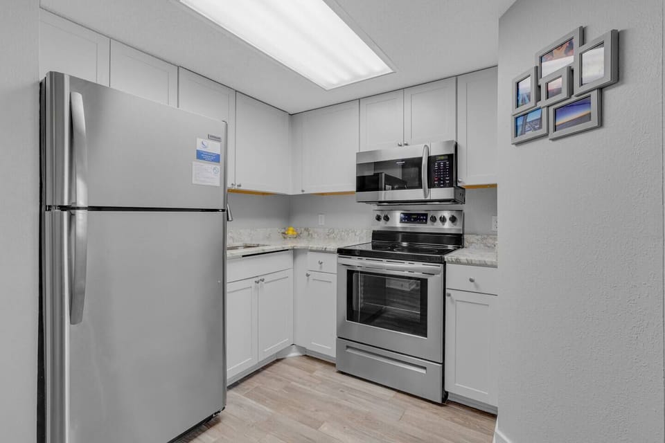 Gather the family for a delightful cooking experience in our suite's kitchen, a spacious and family-friendly setting perfect for creating lasting memories.