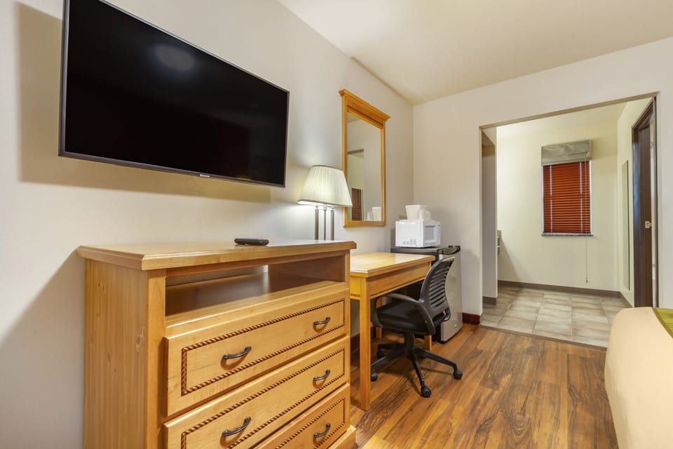 Desk, laptop workspace, iron/ironing board, rollaway beds