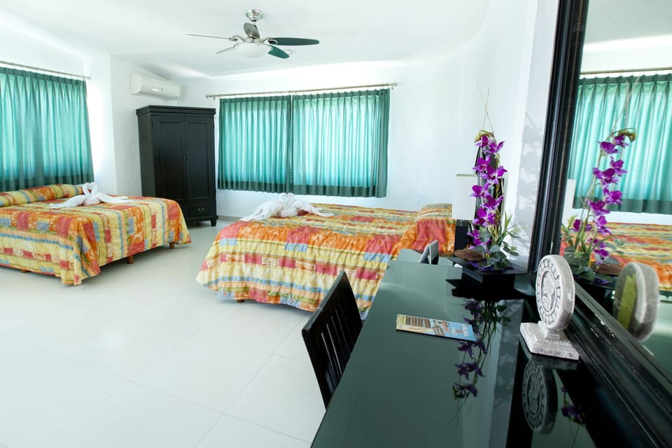 Suite, 2 Queen Beds | Premium bedding, in-room safe, individually decorated