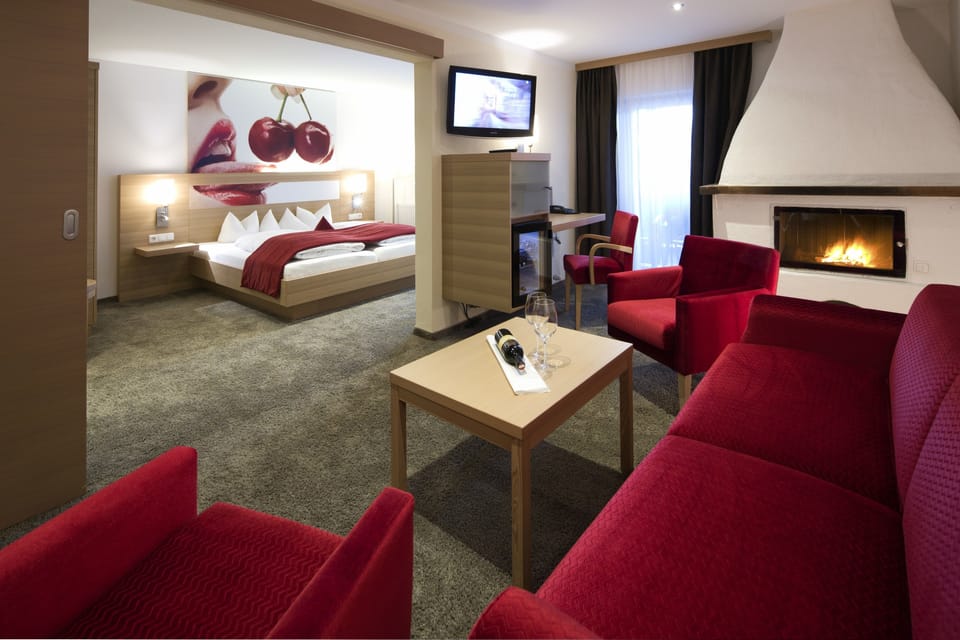 Suite, Lake View | Living room | Flat-screen TV