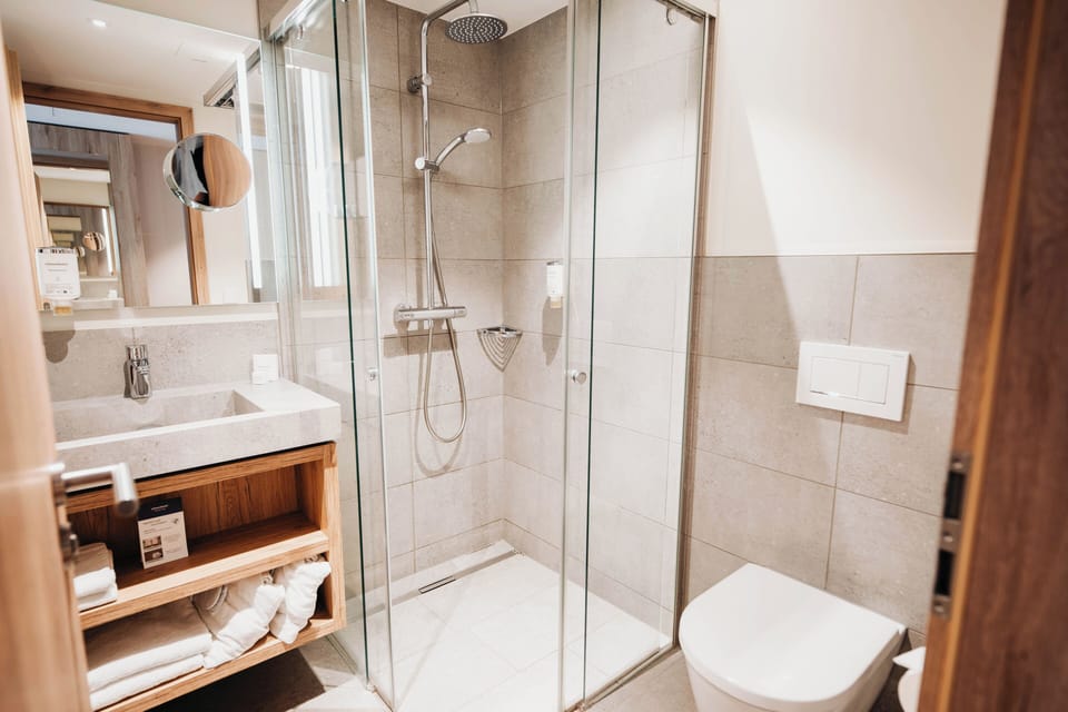 Standard Double Room, Balcony | Bathroom | Shower, free toiletries, hair dryer, bathrobes
