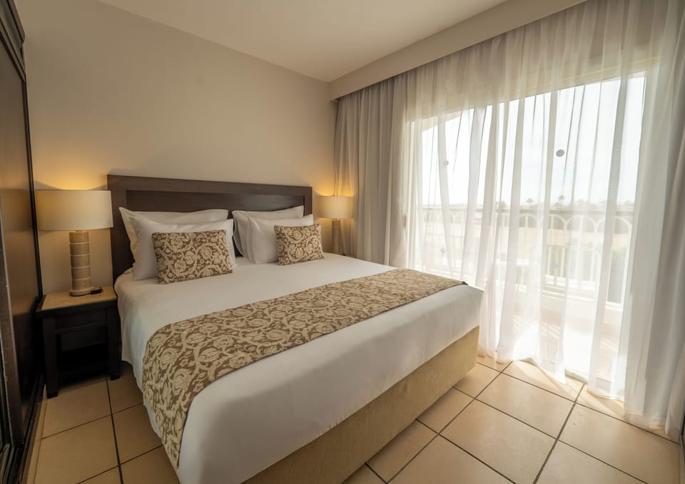 Family, Queen Bed, Garden View | Select Comfort beds, in-room safe, blackout drapes, iron/ironing board