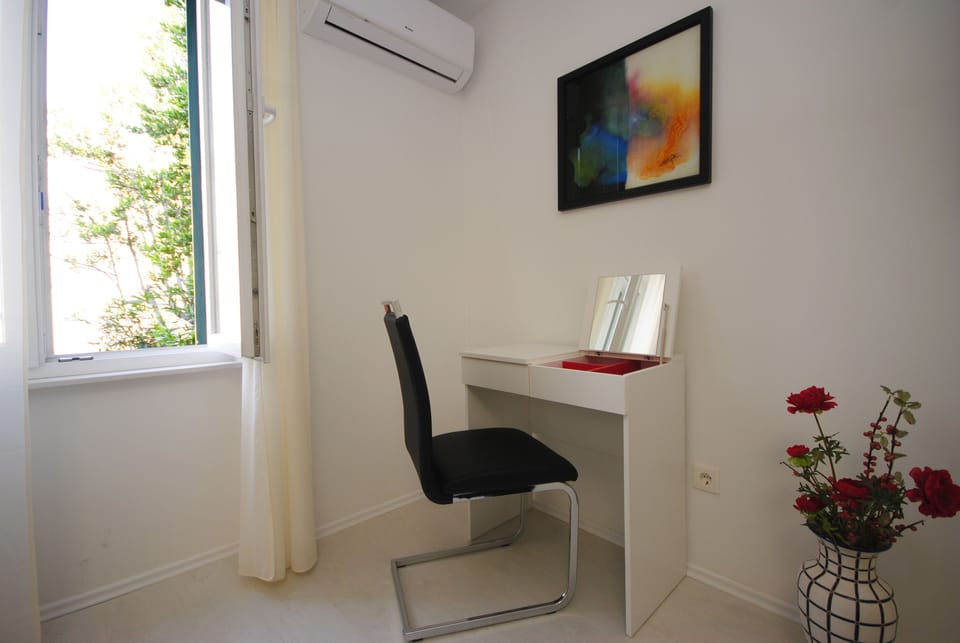 Apartment, Balcony | 2 bedrooms, in-room safe, individually decorated, individually furnished