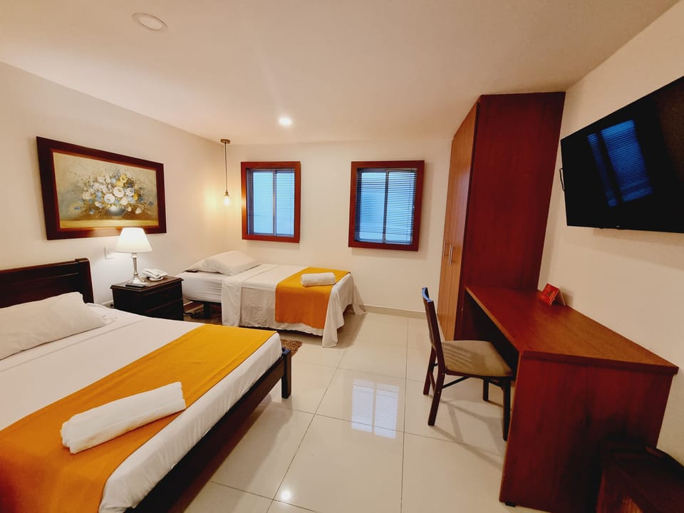 Premium bedding, memory foam beds, in-room safe, desk