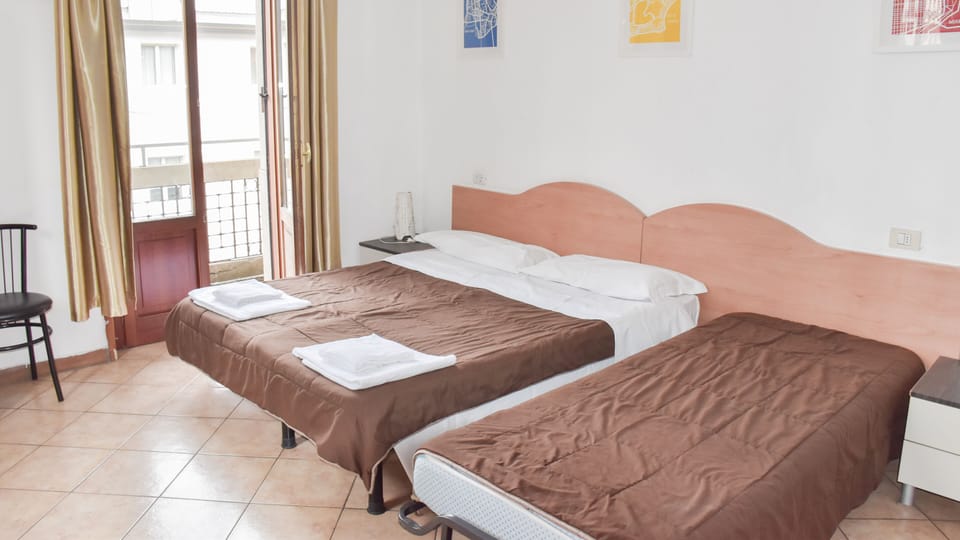 Basic Triple Room | 1 bedroom, desk, laptop workspace, blackout drapes