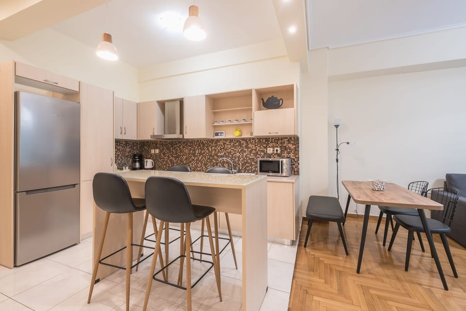 Luxury Apartment, Ground Floor | Private kitchen | Fridge, microwave, oven, stovetop
