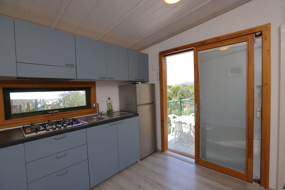 Panoramic Bungalow, Partial Sea View | Private kitchen | Stovetop, cookware/dishes/utensils, freezer