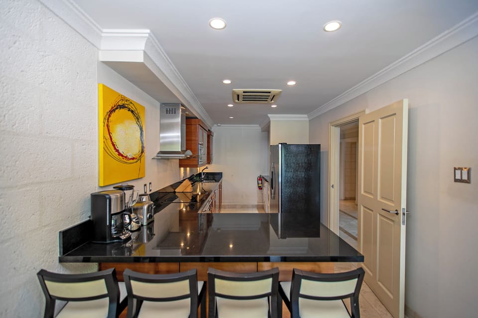 Deluxe Apartment, 2 Bedrooms, Non Smoking | Private kitchen | Full-size fridge, microwave, oven, stovetop