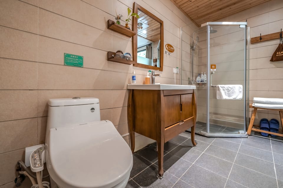 Shower, rainfall showerhead, designer toiletries, hair dryer
