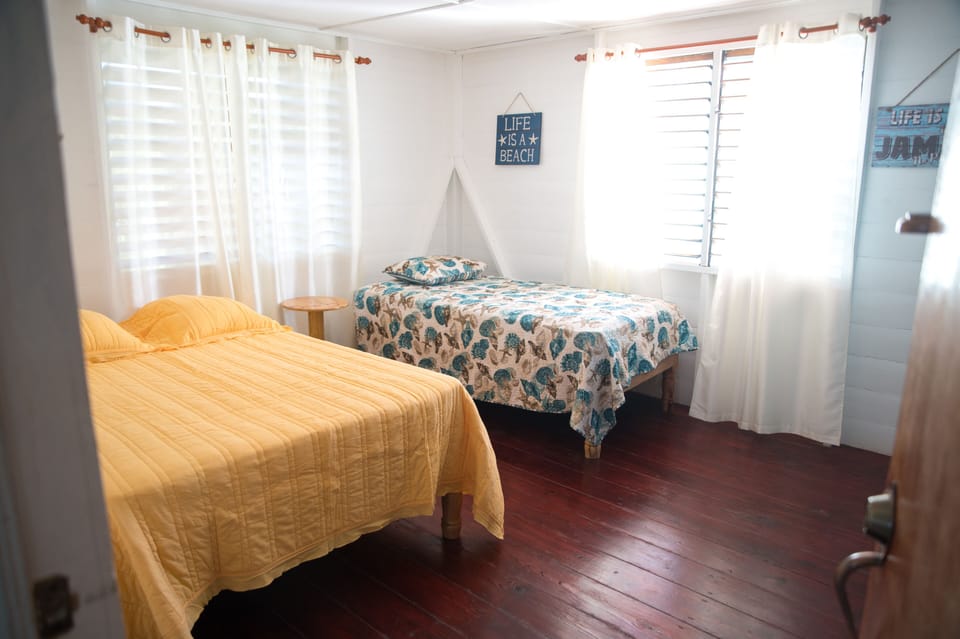 Family Cottage, 2 Bedrooms | Iron/ironing board, WiFi (free), bed sheets