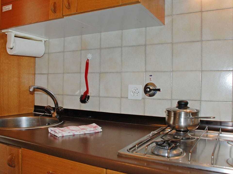 Countertop, Kitchen, Room, Property, Tile, Sink, Cabinetry, Furniture, Kitchen Appliance, Interior Design