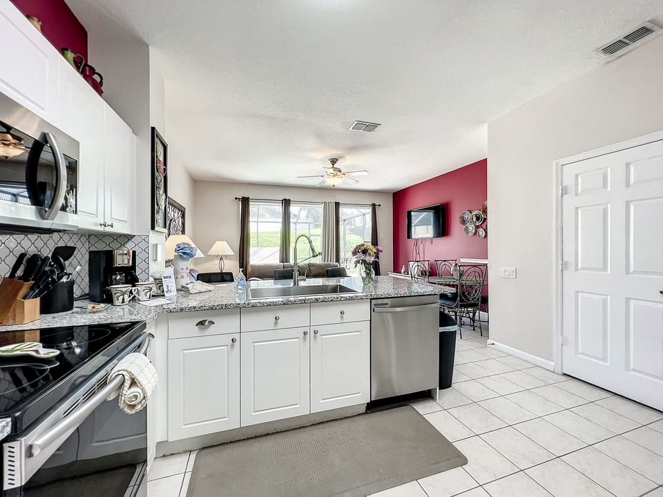 Open kitchen layout connecting seamlessly to the dining area for easy entertaining.