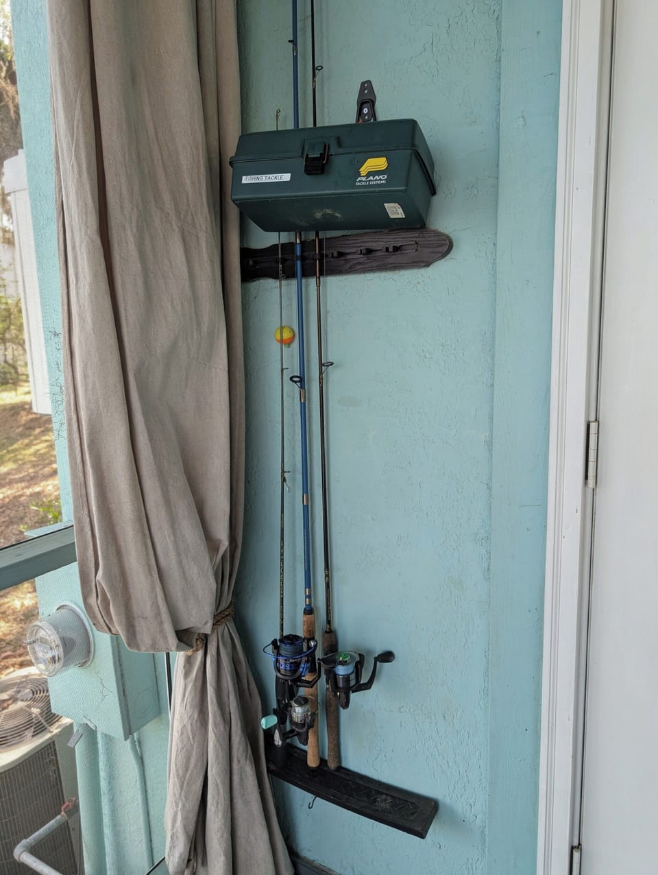 Fishing poles and tackle for use in the backyard. 