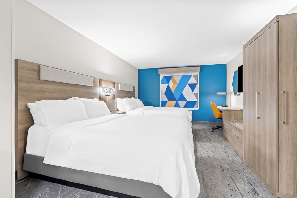 Suite, Multiple Beds | Desk, iron/ironing board, free cribs/infant beds, free rollaway beds