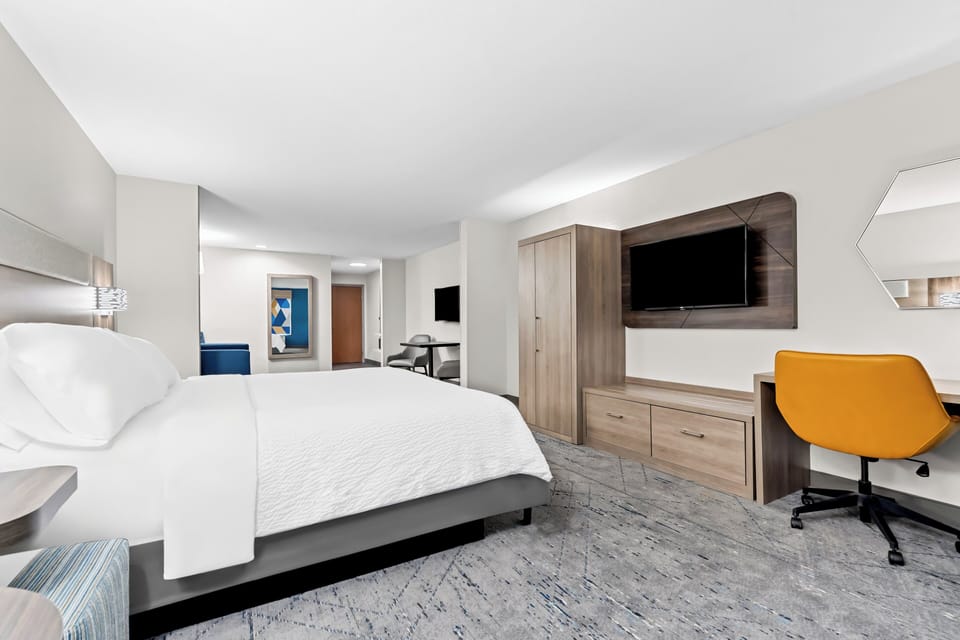 Suite, 1 King Bed | Desk, iron/ironing board, free cribs/infant beds, free rollaway beds