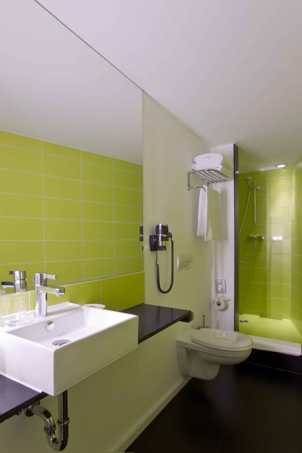 Shower, designer toiletries, hair dryer, towels