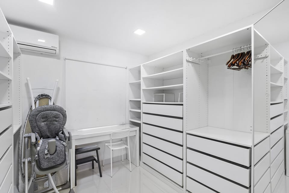 Stay organized with ease in the Master’s bedroom walk-in closet, designed for maximum storage and style.