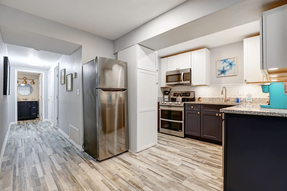 Kitchen area sporting all new cabinets and appliances. 