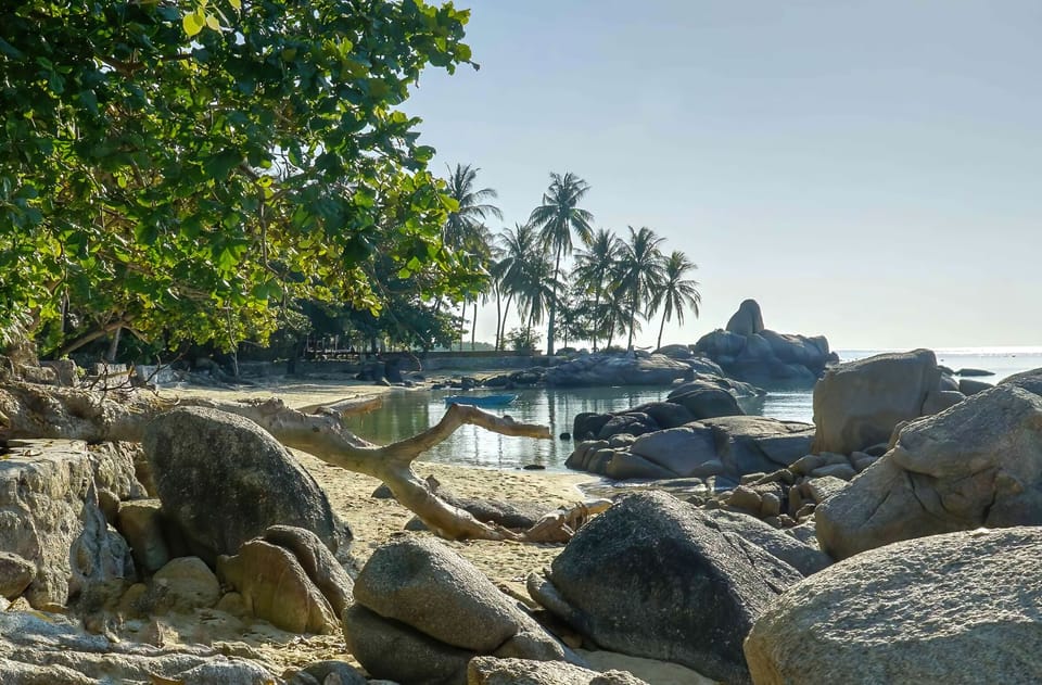 Take a walk along local Laem Set beach 