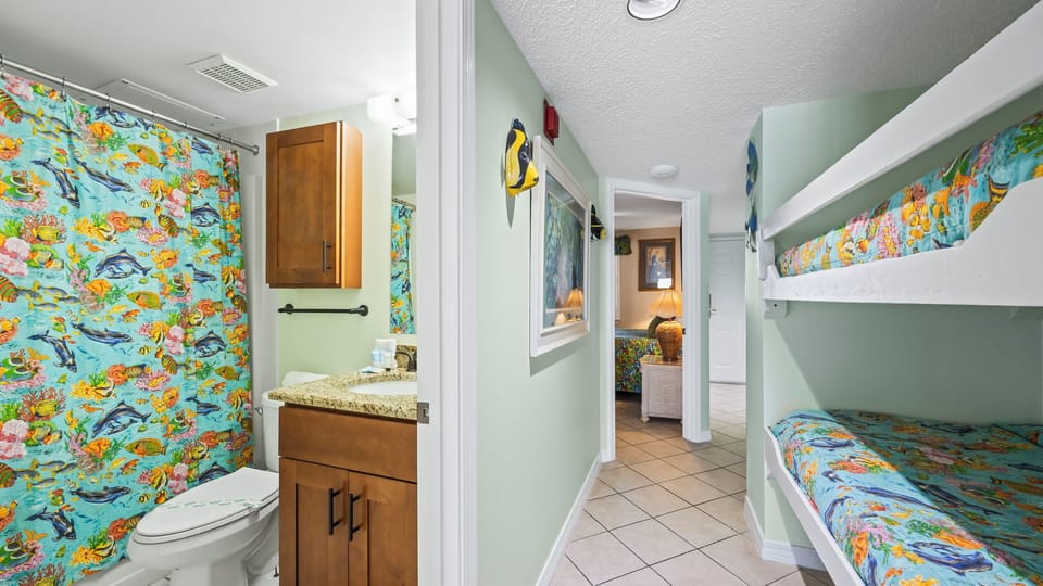 Royal Palms 406 - Hallway bunk beds with easy access to the shared bathroom.