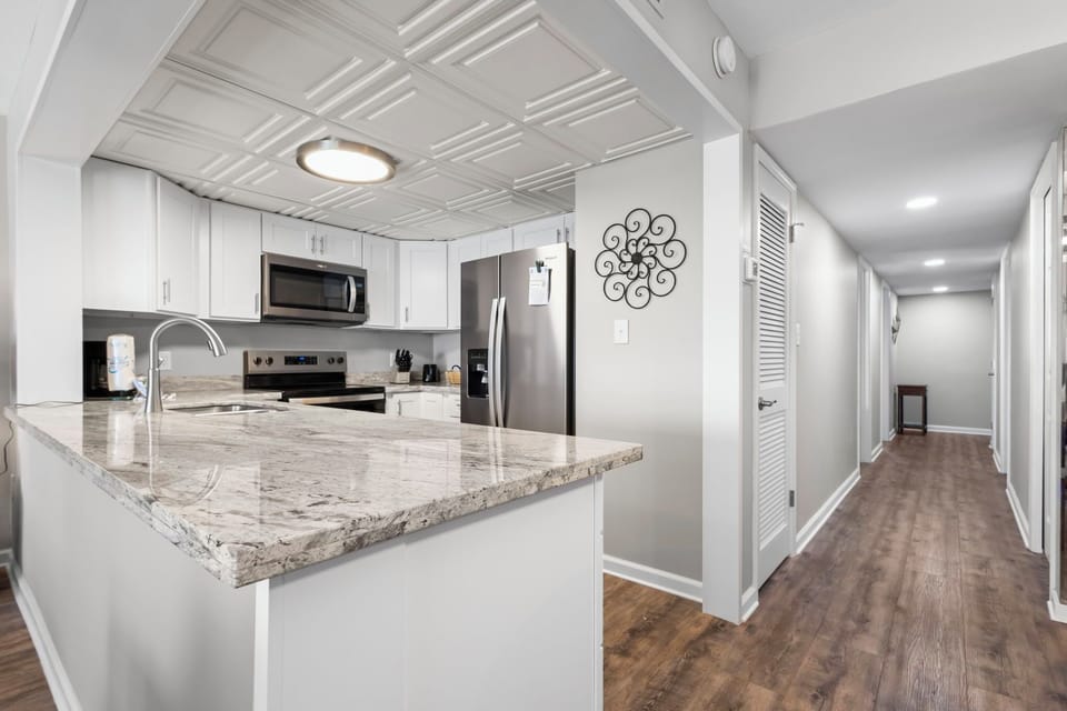 Gulf Tower 7D Kitchen into Hallway