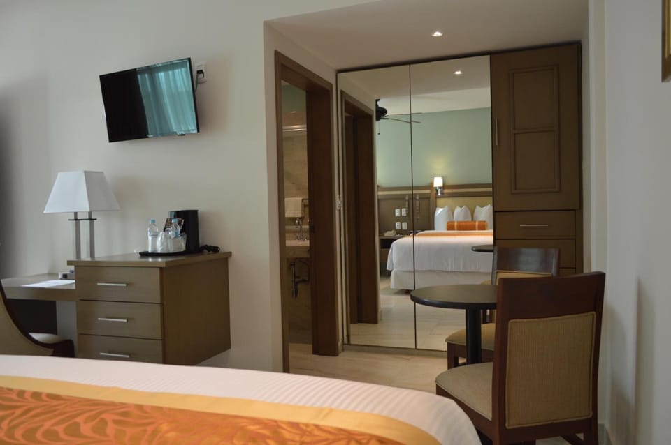 Premium bedding, down comforters, pillowtop beds, in-room safe