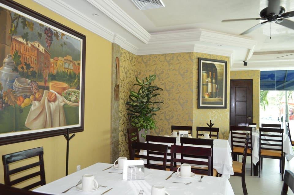 Breakfast, lunch, dinner served; local cuisine 