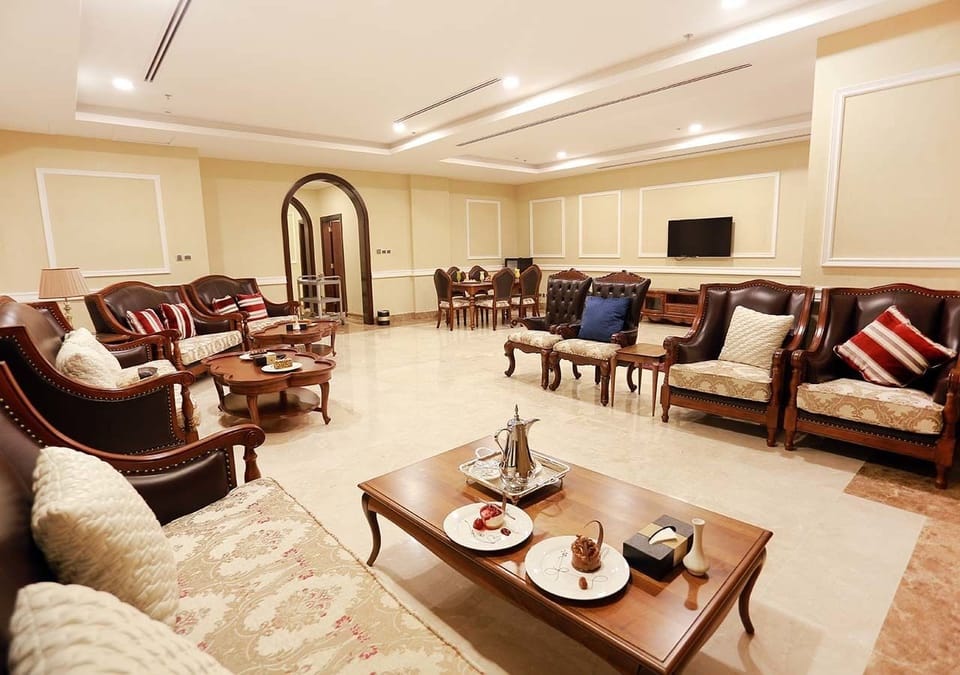 Royal Suite, 3 Bedrooms | Living area | Flat-screen TV, fireplace, heated floors