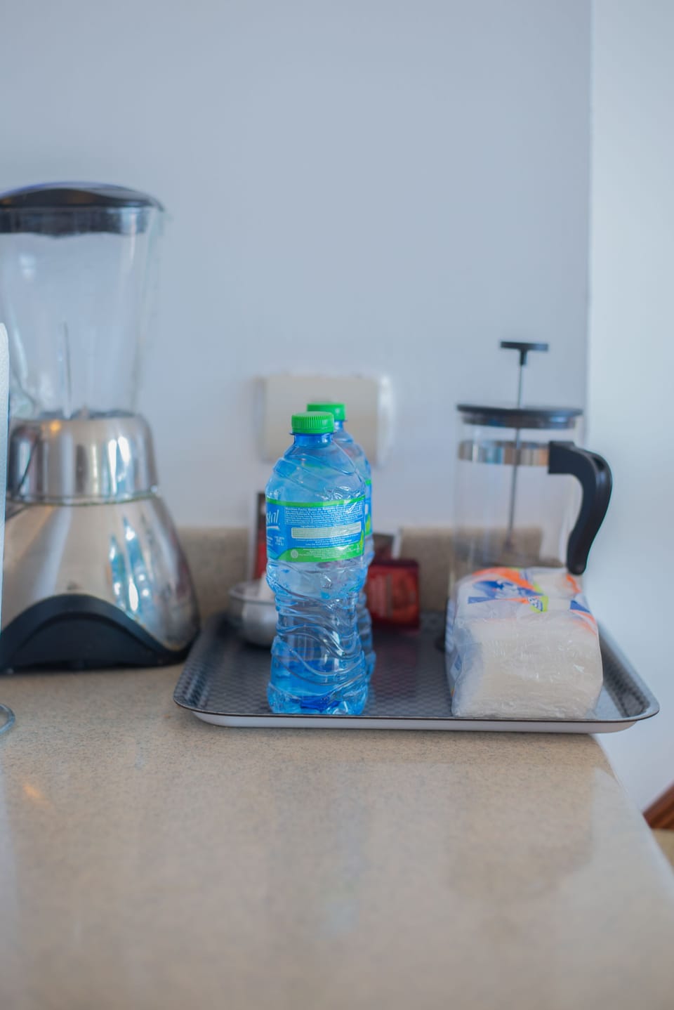 Complimentary Welcome Coffee and Sugar Packs, Napkins and Bottled Water