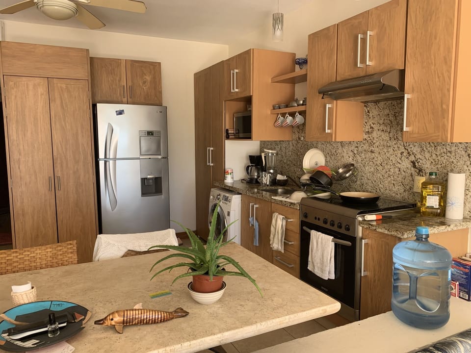 large kitchen table and two chairs