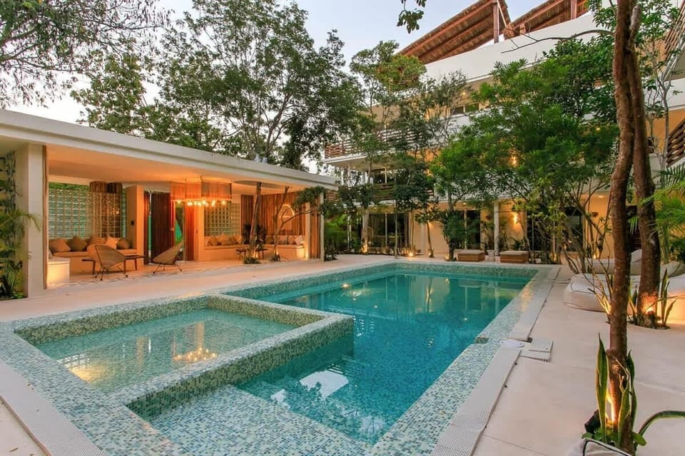 The condo pool area at dusk is so romantic!