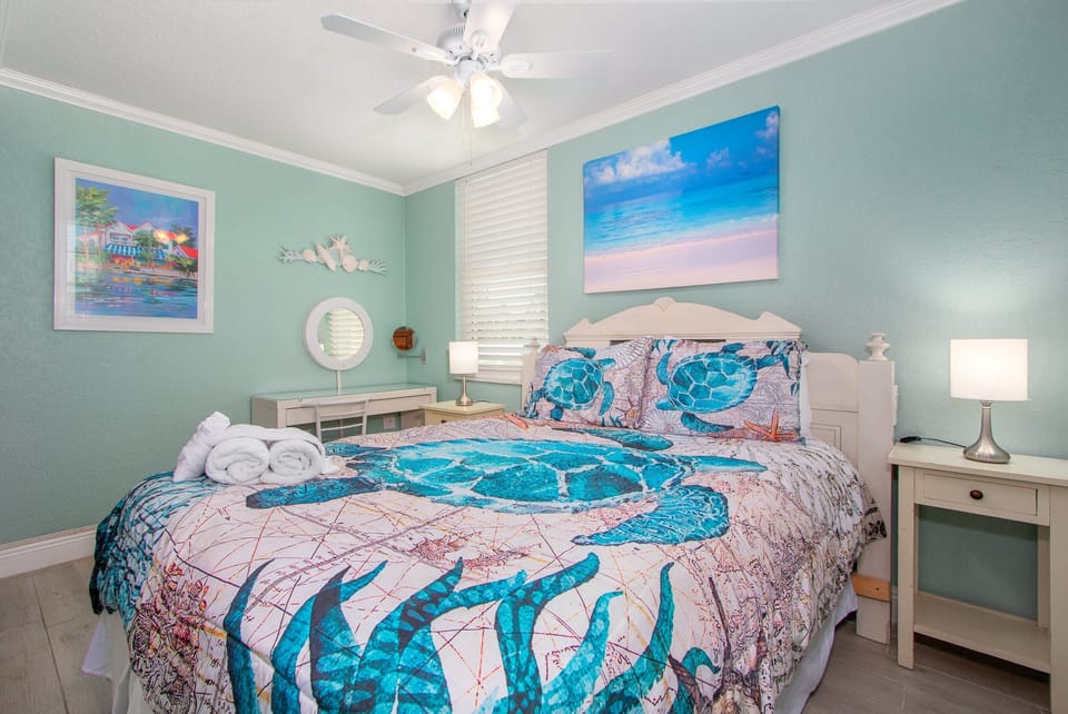 Master Bedroom: King sized bed, ceiling fan, smart tv. Perfect for unwinding!