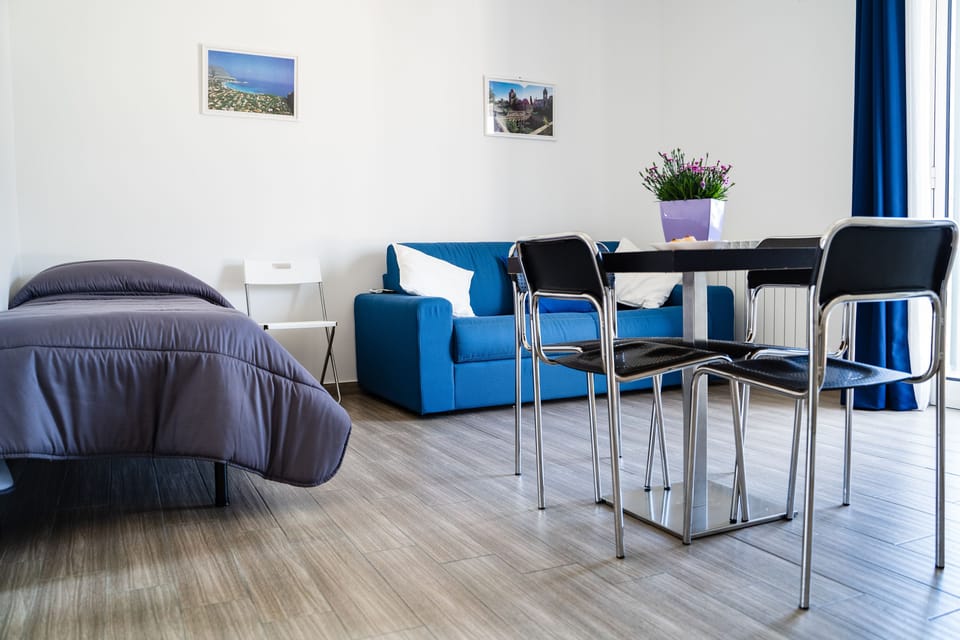 Family Room, Multiple Beds, Partial Sea View | Blackout drapes, free WiFi, bed sheets