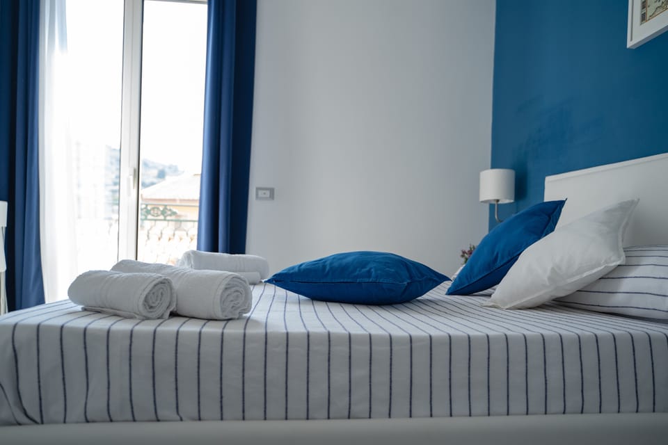 Comfort Room, 1 Queen Bed, City View | Blackout drapes, free WiFi, bed sheets