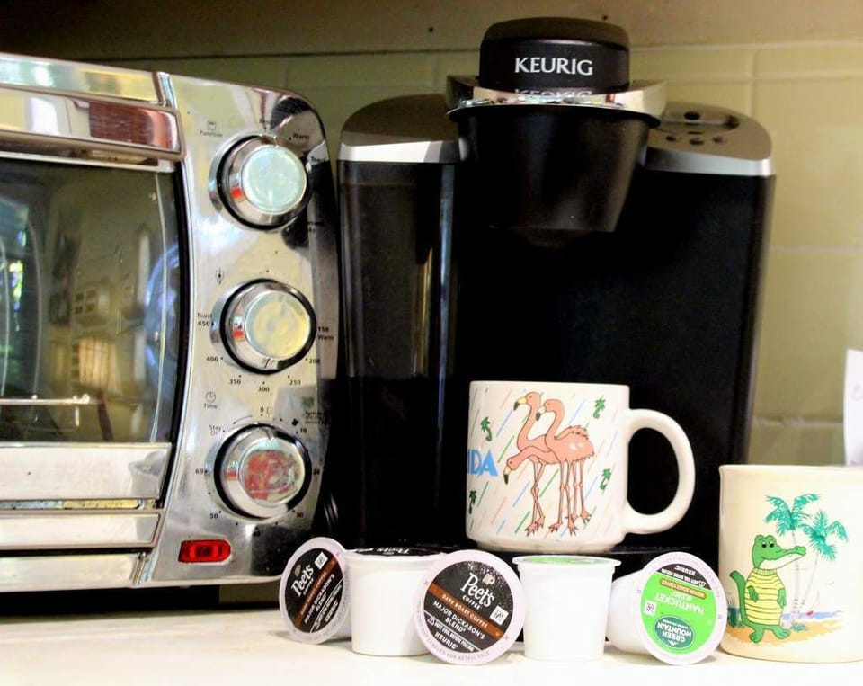 Two coffeemakers...a Keurig coffee maker and an automatic drip coffee maker