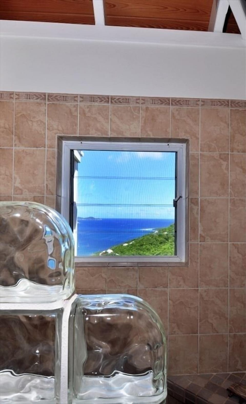 Shower while taking in amazing views of the Caribbean Sea 