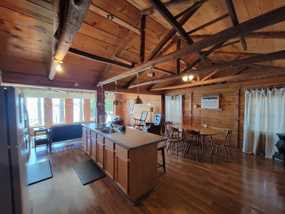 Open kitchen/ dining/ living area