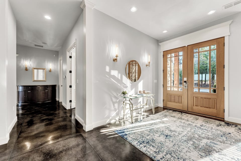 Gorgeous entryway with view down the hall toward the master bedroom.