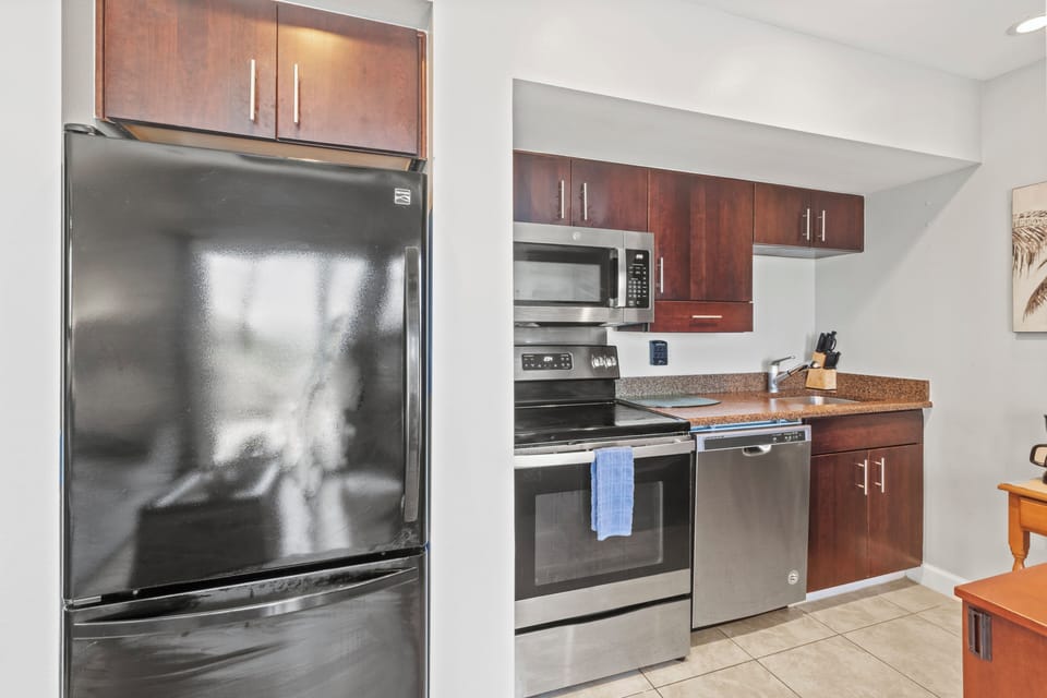 Kitchen is in studio room next to murphy bed
