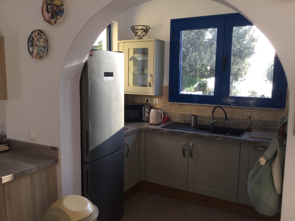 Kitchen with full cooking facilities and lovely views when washing up