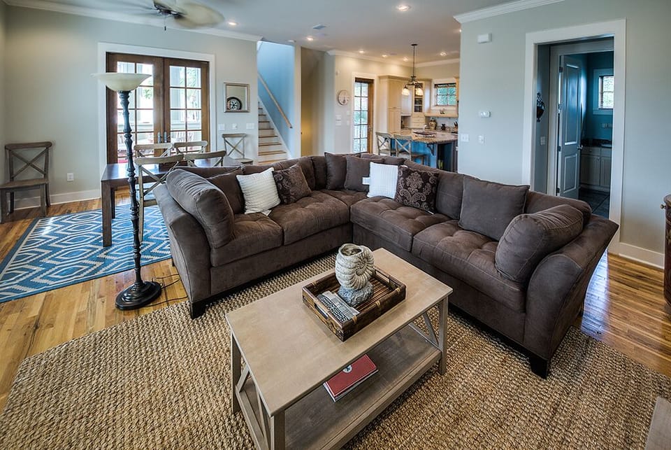 Sectional Sofa, Coffee Table, Dining Table, and Chairs.