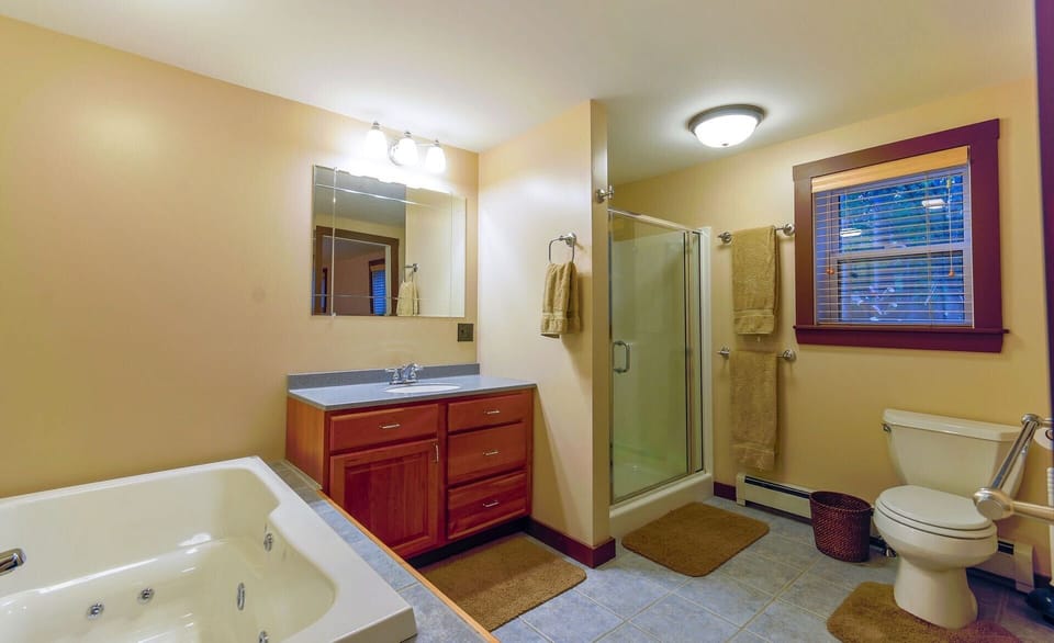 master bath with tub and shower