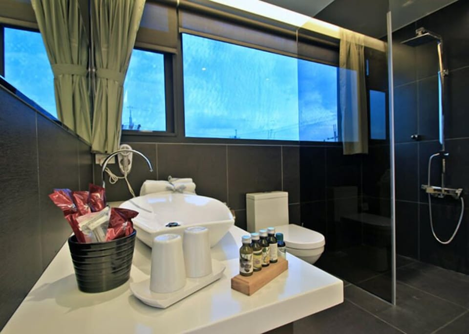 Shower, free toiletries, hair dryer, slippers